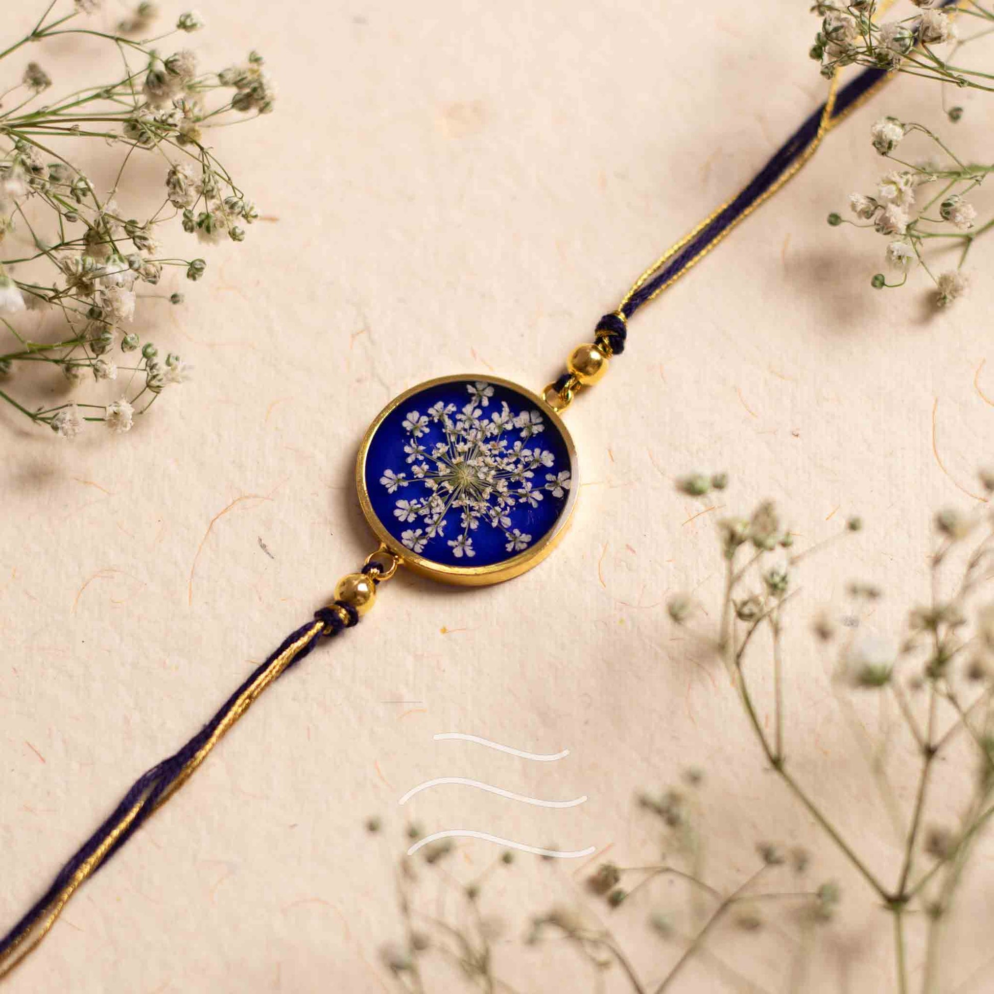 Tirchi Nazar Rakhi - Real flower Jewellery - Leafy Affair